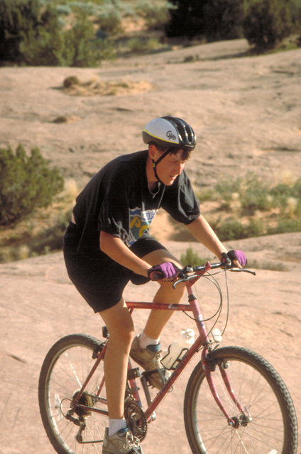 man on bike example of situation when heat stroke can occur to explain sun blocking clothing for you