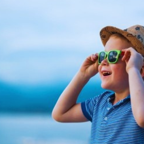 Boy in hat and sunglasses