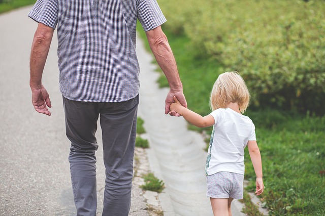 A dad with a med pale shirt and daughter with a whit shit will the get the sun protection the need.  Loose fit and dark colors increase shirts sun protection.