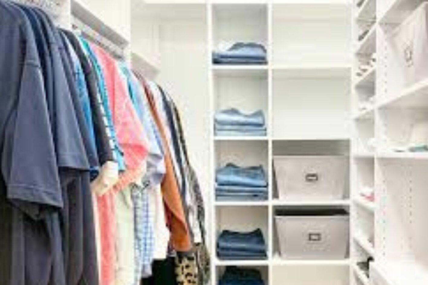neatly arranged closet with shirts to illustrate many colors to protect your skin from the sun